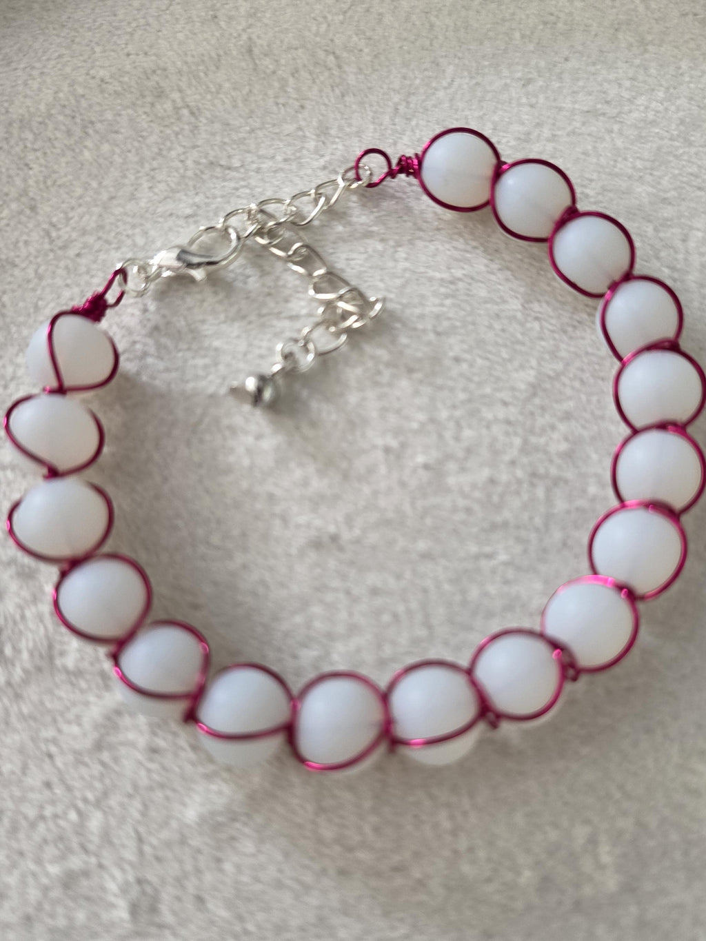 white milky glass bead bracelet with metal braid