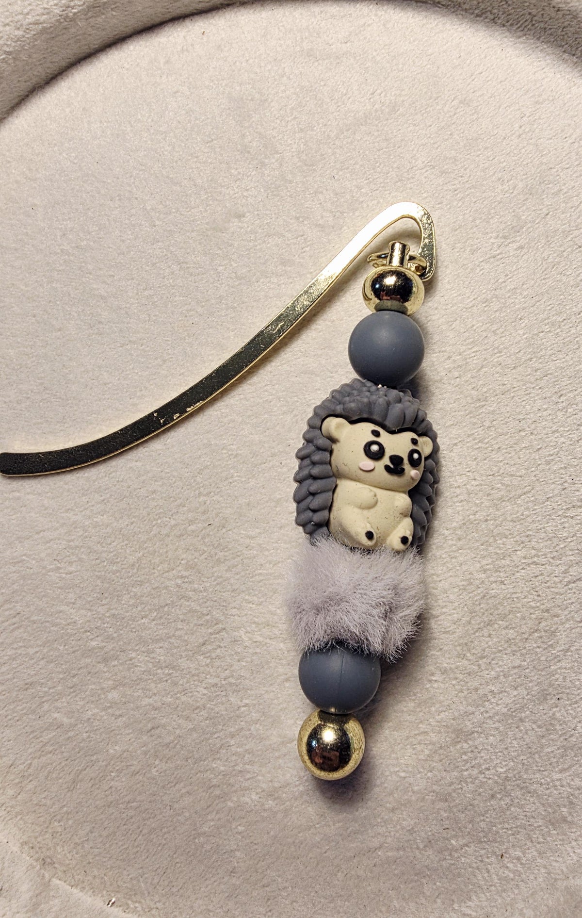 Grey hedgehog bookmark with pompom fluffy bead