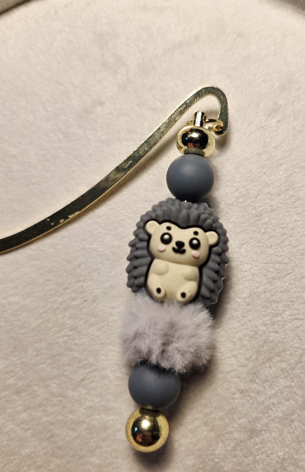 Grey hedgehog bookmark with pompom fluffy bead