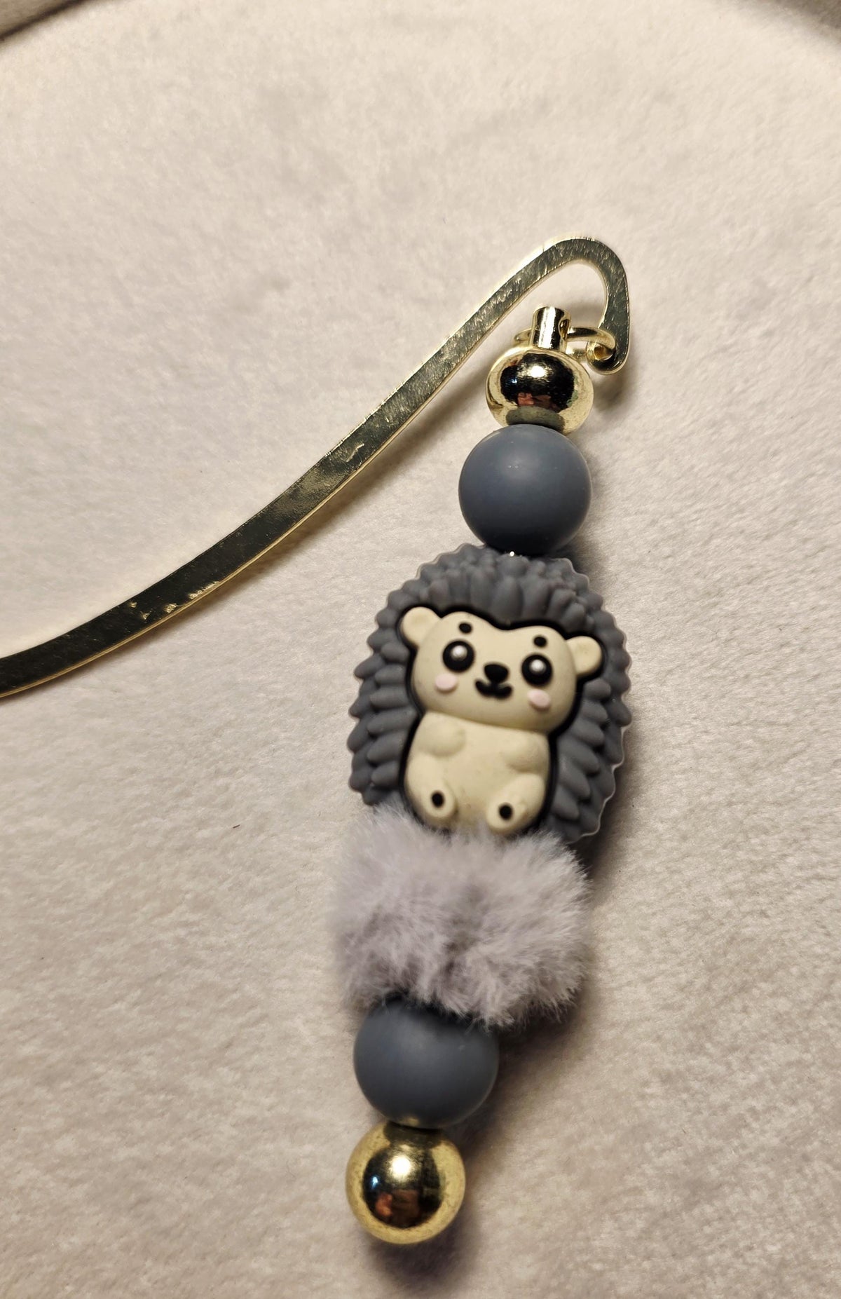 Grey hedgehog bookmark with pompom fluffy bead