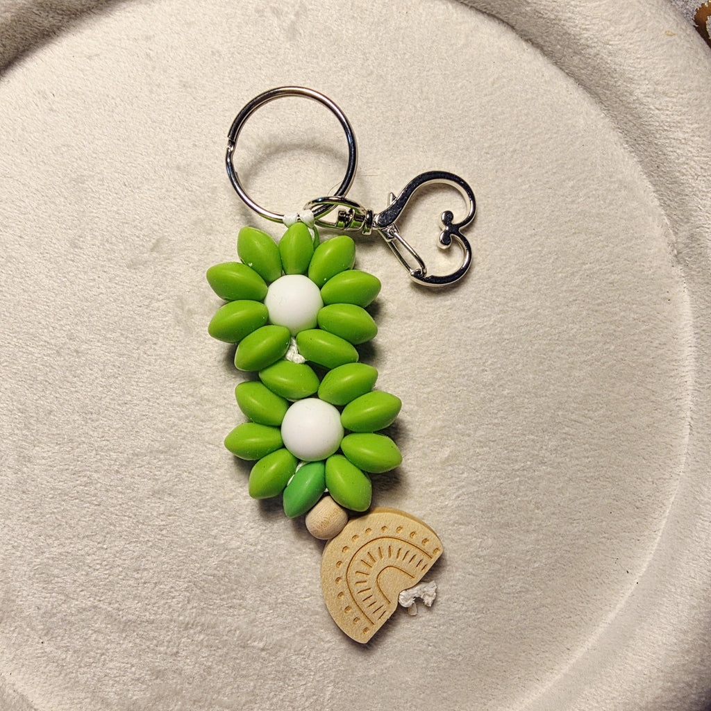 Daisy bloom keychain with wooden rainbow charm