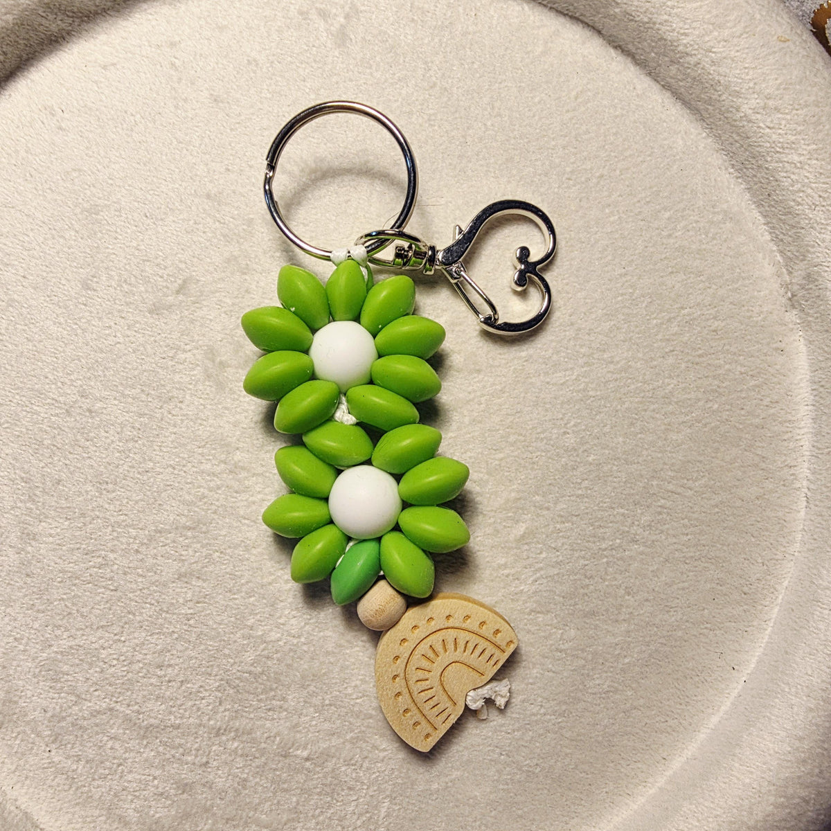 Daisy bloom keychain with wooden rainbow charm