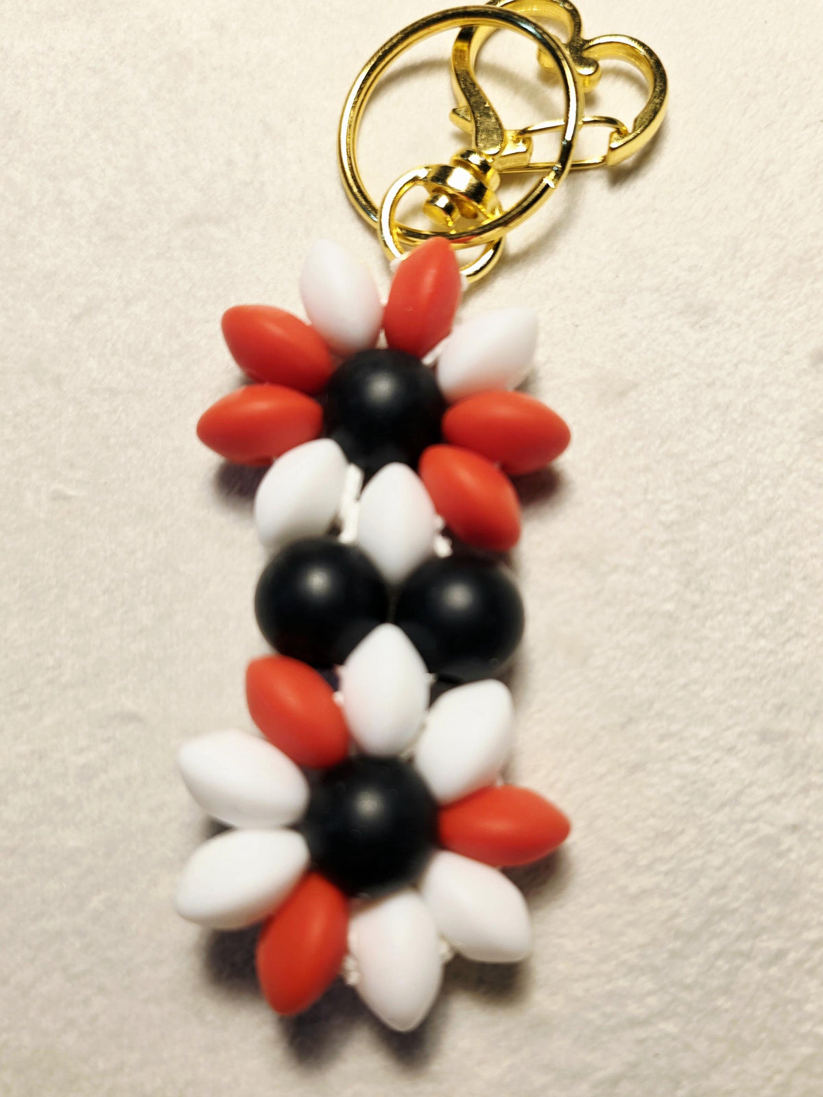 Red, black and white silicone bead flowers keychain
