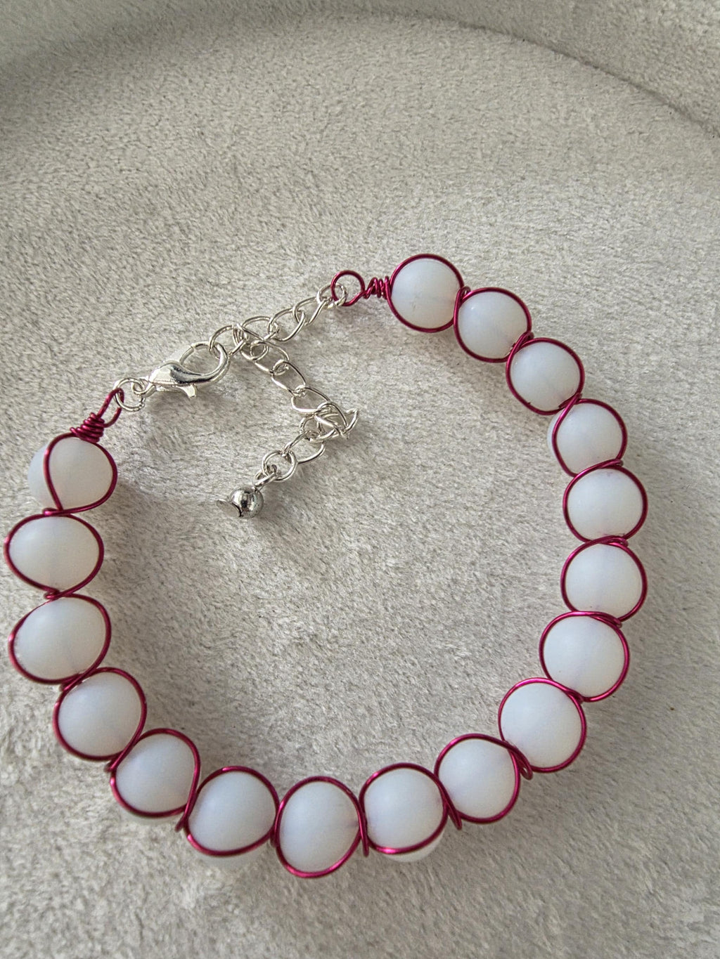 white milky glass bead bracelet with metal braid