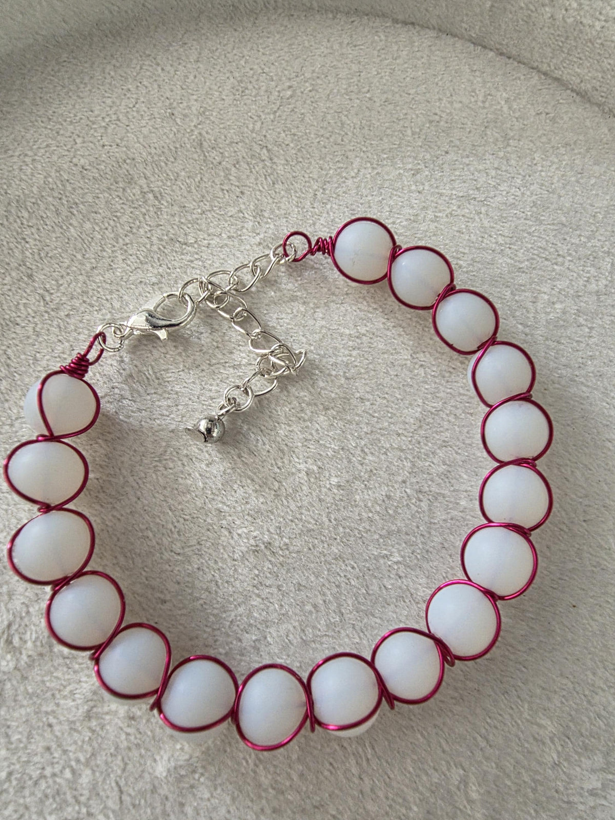 white milky glass bead bracelet with metal braid