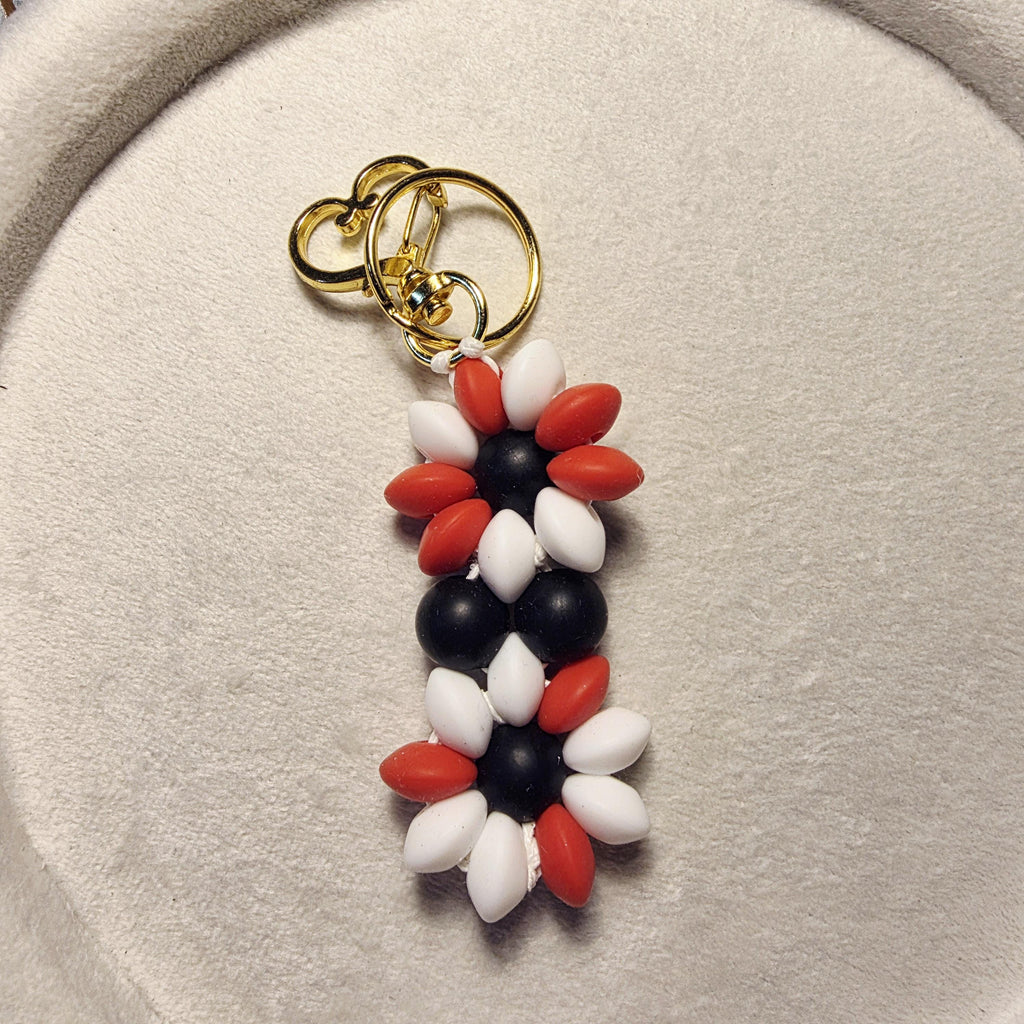Red, black and white silicone bead flowers keychain