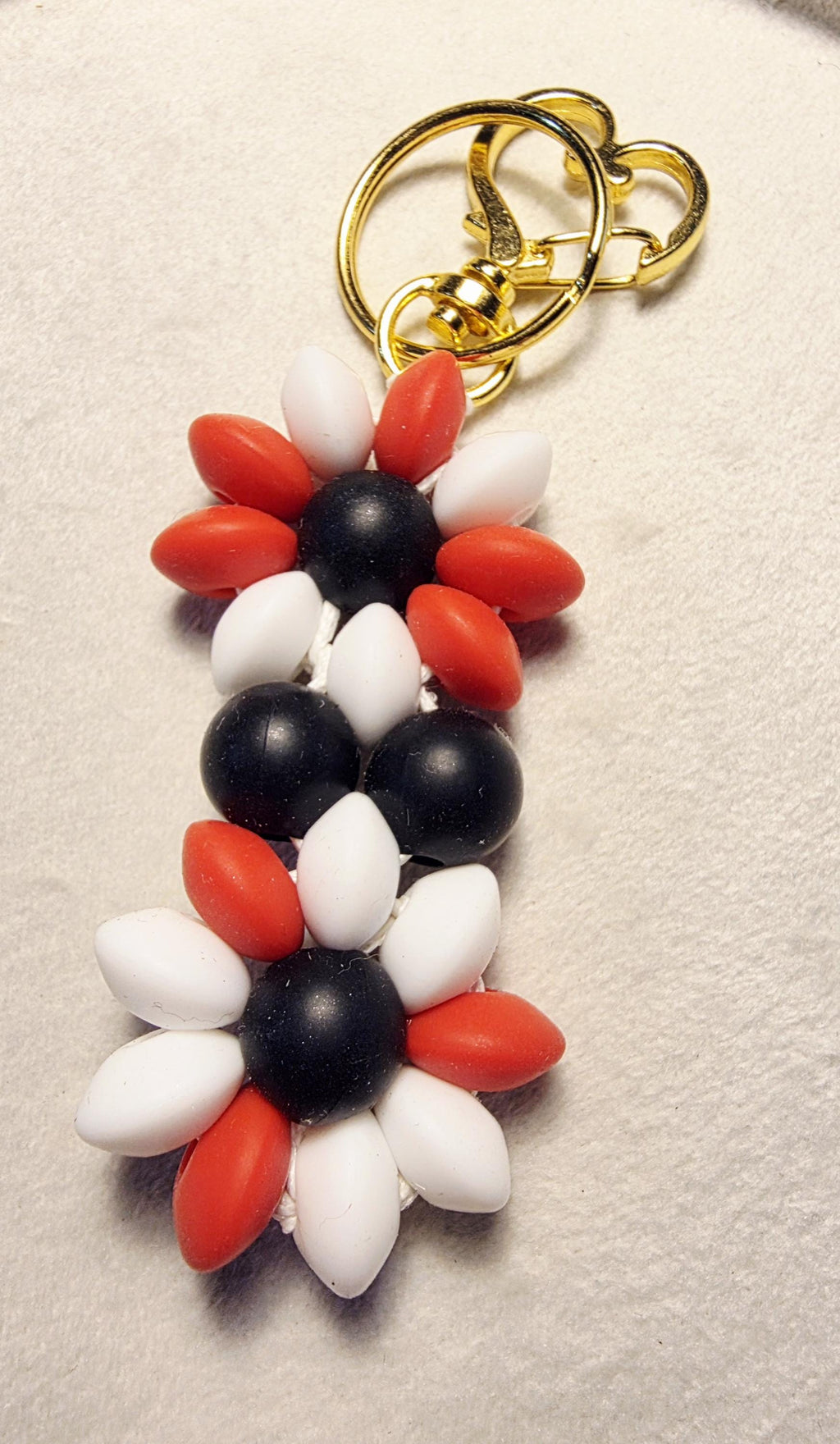 Red, black and white silicone bead flowers keychain