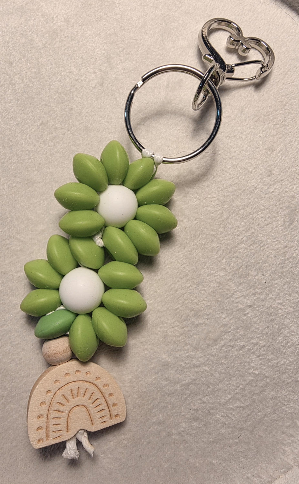 Daisy bloom keychain with wooden rainbow charm